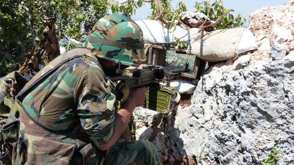 Syrian troops carrying out operations against militants in Latakia. - Sputnik International