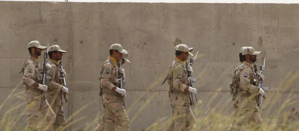 Iranian soldiers keep watch at a drug trafficking patrol post in Milak, southeastern Iran, near the Afghan border, on July 19, 2011 - Sputnik International