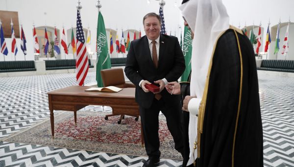 US Secretary of State Mike Pompeo receives a gift during a visit to the Saudi capital Riyadh, on October 16, 2018. Pompeo held talks with Saudi King Salman seeking answers about the disappearance of journalist Jamal Khashoggi, amid US media reports the kingdom may be mulling an admission he died during a botched interrogation. US Secretary of State Mike Pompeo receives a gift during a visit to the Saudi capital Riyadh, on October 16, 2018. Pompeo held talks with Saudi King Salman seeking answers about the disappearance of journalist Jamal Khashoggi, amid US media reports the kingdom may be mulling an admission he died during a botched interrogation. - Sputnik International
