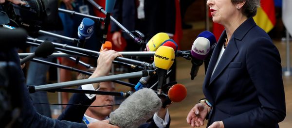 Britain's Prime Minister Theresa May arrives at an European Union leaders summit in Brussels, Belgium October 17, 2018. Britain's Prime Minister Theresa May arrives at an European Union leaders summit in Brussels, Belgium October 17, 2018. - Sputnik International