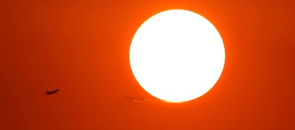 Two planes fly in front of the setting sun in Shanghai, China October 2, 2018 Two planes fly in front of the setting sun in Shanghai, China October 2, 2018 - Sputnik International
