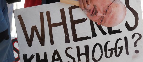 An activist holds a sign and image of missing Saudi journalist Jamal Khashoggi during a demonstration calling for sanctions against Saudi Arabia and to protest Khashoggi's disappearance, outside the White House in Washington, U.S., October 19, 2018 An activist holds a sign and image of missing Saudi journalist Jamal Khashoggi during a demonstration calling for sanctions against Saudi Arabia and to protest Khashoggi's disappearance, outside the White House in Washington, U.S., October 19, 2018 - Sputnik International