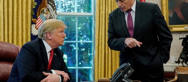 U.S. President Donald Trump speaks to White House Chief of Staff John Kelly after an event with reporters in the Oval Office at the White House in Washington, U.S. October 10, 2018 U.S. President Donald Trump speaks to White House Chief of Staff John Kelly after an event with reporters in the Oval Office at the White House in Washington, U.S. October 10, 2018 - Sputnik International