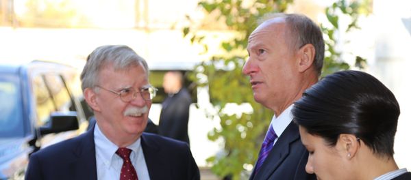 Russian Security Council Secretary Nikolai Patrushev (second from right) and US National Security Adviser John Bolton during a meeting in Moscow. - Sputnik International