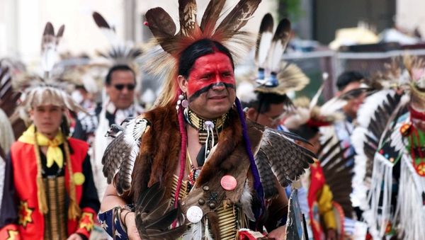 Eddie Two-Clouds, an Apache from Duncan, Okla., marches in the 13th annual Red Earth Festival Parade in downtown Oklahoma City Friday, June 11,1999. - Sputnik International