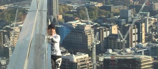 Alain Robert, known as 'Spiderman', climbs the Heron Tower in London Alain Robert, known as 'Spiderman', climbs the Heron Tower in London - Sputnik International