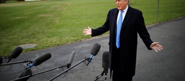 U.S. President Donald Trump talks to reporters as he departs for campaign travel to North Carolina from the White House in Washington, U.S., October 22, 2018. U.S. President Donald Trump talks to reporters as he departs for campaign travel to North Carolina from the White House in Washington, U.S., October 22, 2018. - Sputnik International