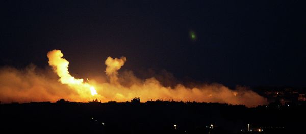 The sky is illuminated by explosions from Israeli military operations over the outskirts of Gaza City as seen from the Israel-Gaza Border. FILE PHOTO The sky is illuminated by explosions from Israeli military operations over the outskirts of Gaza City as seen from the Israel-Gaza Border. FILE PHOTO - Sputnik International