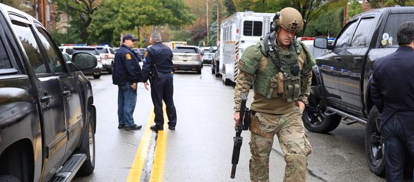 Police officers respond after a gunman opened fire at the Tree of Life synagogue in Pittsburgh Pennsylvania. Police officers respond after a gunman opened fire at the Tree of Life synagogue in Pittsburgh Pennsylvania. - Sputnik International