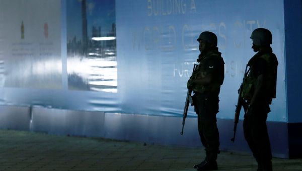 Sri Lankan army soldiers stand guard in front of the Presidential Secretariat before the start of the meeting between newly appointed Prime Minister Mahinda Rajapaksa and President Maithripala Sirisena in Colombo, Sri Lanka October 27, 2018 - Sputnik International