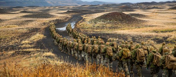U.S. Marines with the 24th Marine Expeditionary Unit, deployed during Exercise Trident Juncture 18, hike to a cold-weather training site inland in Iceland, October 19, 2018. Picture taken October 19, 2018 U.S. Marines with the 24th Marine Expeditionary Unit, deployed during Exercise Trident Juncture 18, hike to a cold-weather training site inland in Iceland, October 19, 2018. Picture taken October 19, 2018 - Sputnik International