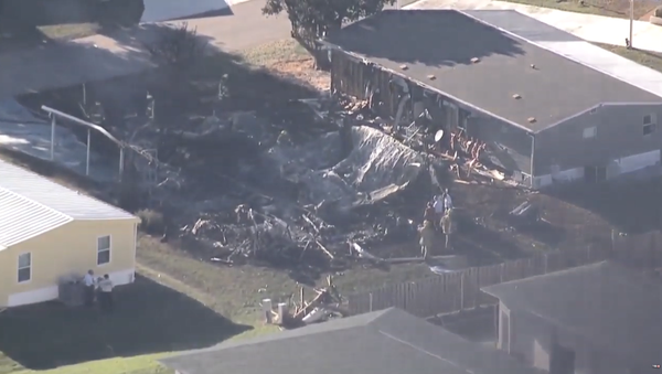 Smoldering aftermath of a gyroplane crash in Sebring, Florida - Sputnik International