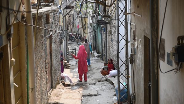 Pakistani women gather at a Christian colony in Islamabad on October 31, 2018, after the Supreme Court decision to overturn the conviction of Christian woman Asia Bibi - Sputnik International