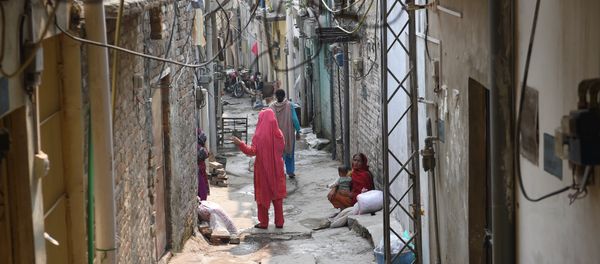Pakistani women gather at a Christian colony in Islamabad on October 31, 2018, after the Supreme Court decision to overturn the conviction of Christian woman Asia Bibi Pakistani women gather at a Christian colony in Islamabad on October 31, 2018, after the Supreme Court decision to overturn the conviction of Christian woman Asia Bibi - Sputnik International