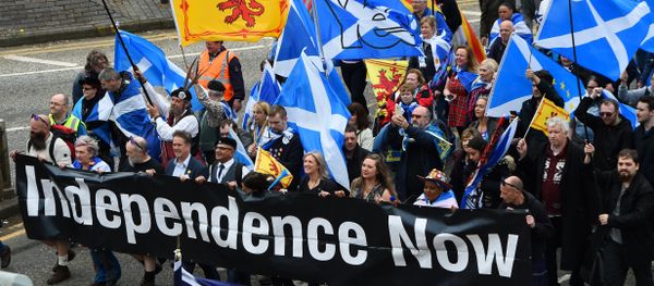 Thousands of demonstrators carry Saltire flags, the national flag of Scotland, as they march in support of Scottish independence through the streets of Glasgow, on May 5, 2018 Thousands of demonstrators carry Saltire flags, the national flag of Scotland, as they march in support of Scottish independence through the streets of Glasgow, on May 5, 2018 - Sputnik International