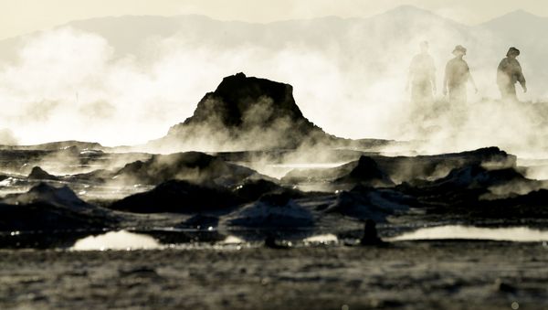 In this April 29, 2015, photo, steam rises from geothermal mud pots near the banks of the Salton Sea near Niland, Calif., evidence of the region's vast geothermal activity. Often called the The Accidental Sea, because it was created when the Colorado River breached a dike in 1905, Salton Sea now faces a looming calamity as coastal Southern California clamors for more water. - Sputnik International