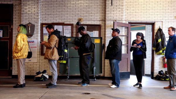 Voters wait to cast their ballots at a fire station serving as a voting place for the midterm election in Detroit - Sputnik International