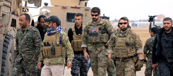 Syrian Democratic Forces and U.S. troops are seen during a patrol near Turkish border in Hasakah, Syria November 4, 2018 - Sputnik International