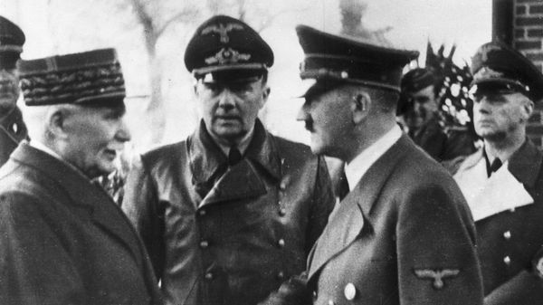 This Oct. 24, 1940 file photo shows German Chancellor Adolf Hitler, right, shaking hands with Head of State of Vichy France Marshall Philippe Petain, in occupied France.  - Sputnik International