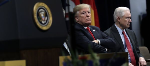 President Donald Trump, listens to FBI Director Christopher Wray speak, with Attorney General Jeff Sessions, right, at the FBI National Academy graduation ceremony, Friday, Dec. 15, 2017, in Quantico, Va. President Donald Trump, listens to FBI Director Christopher Wray speak, with Attorney General Jeff Sessions, right, at the FBI National Academy graduation ceremony, Friday, Dec. 15, 2017, in Quantico, Va. - Sputnik International