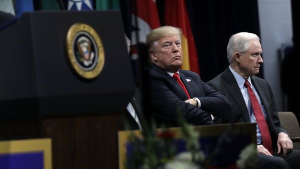 President Donald Trump, listens to FBI Director Christopher Wray speak, with Attorney General Jeff Sessions, right, at the FBI National Academy graduation ceremony, Friday, Dec. 15, 2017, in Quantico, Va. President Donald Trump, listens to FBI Director Christopher Wray speak, with Attorney General Jeff Sessions, right, at the FBI National Academy graduation ceremony, Friday, Dec. 15, 2017, in Quantico, Va. - Sputnik International