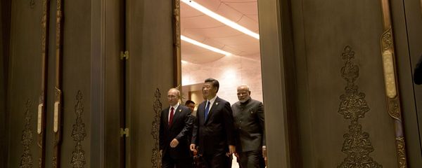 (L to R) Russian President Vladimir Putin, Chinese President Xi Jinping and Indian Prime Minister Narendra Modi arrive for the Dialogue of Emerging Market and Developing Countries on the sidelines of the 2017 BRICS Summit in Xiamen, southeastern China's Fujian Province on September 5, 2017 (L to R) Russian President Vladimir Putin, Chinese President Xi Jinping and Indian Prime Minister Narendra Modi arrive for the Dialogue of Emerging Market and Developing Countries on the sidelines of the 2017 BRICS Summit in Xiamen, southeastern China's Fujian Province on September 5, 2017 - Sputnik International