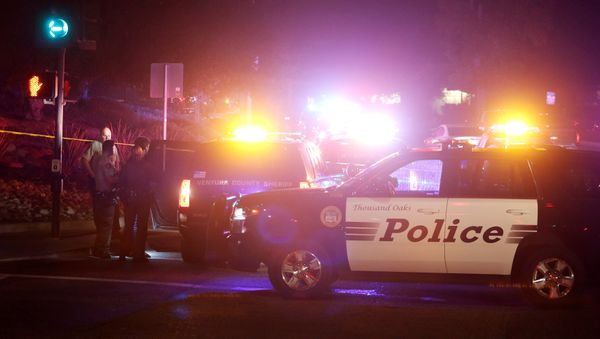 Police guard the site of a mass shooting at a bar in Thousand Oaks, California, US November 8, 2018. - Sputnik International