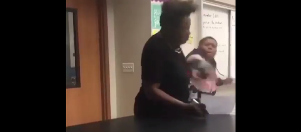 Student punches teacher at school in Baltimore. Student punches teacher at school in Baltimore. - Sputnik International