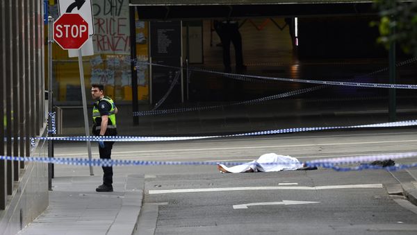 A policeman stands near a body covered with a sheet near the Bourke Street mall in central Melbourne, Australia, November 9, 2018 A policeman stands near a body covered with a sheet near the Bourke Street mall in central Melbourne, Australia, November 9, 2018 - Sputnik International