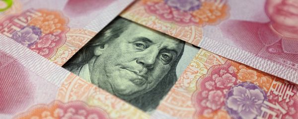 A US 100-dollar banknote with a portrait of Benjamin Franklin and Chinese 100-yuan banknotes with portrait of late Chinese Chairman Mao Zedong are seen in the picture illustration in Beijing, China - Sputnik International