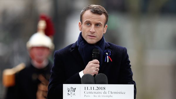 French President Emmanuel Macron at the Arc de Triomphe in Paris - Sputnik International