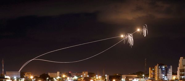 Israeli Iron Dome anti-missile system fires interception missiles Israeli Iron Dome anti-missile system fires interception missiles - Sputnik International