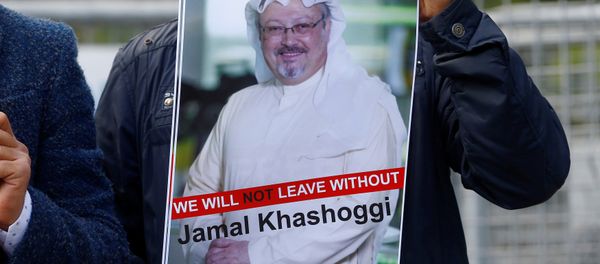 A demonstrator holds picture of Saudi journalist Jamal Khashoggi A demonstrator holds picture of Saudi journalist Jamal Khashoggi - Sputnik International
