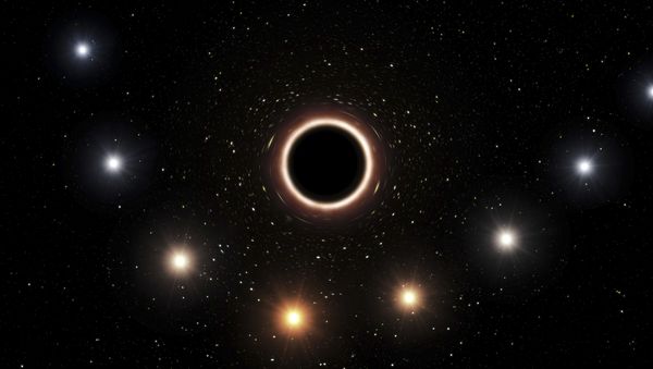 Artist impression shows the path of the star S2 as it passes close to the supermassive black hole at the center of the Milky Way galaxy - Sputnik International