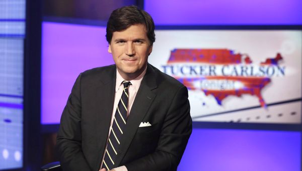Tucker Carlson, host of Tucker Carlson Tonight, poses for photos in a Fox News Channel studio, in New York, Thursday, March 2, 2107. Tucker Carlson, host of Tucker Carlson Tonight, poses for photos in a Fox News Channel studio, in New York, Thursday, March 2, 2107. - Sputnik International
