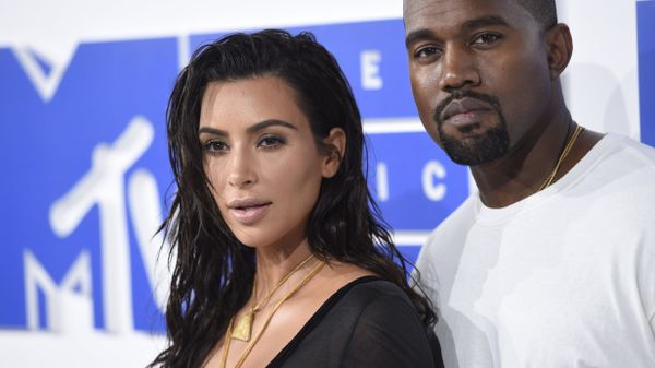 Kim Kardashian West, left, and Kanye West arrive at the MTV Video Music Awards at Madison Square Garden on Sunday, Aug. 28, 2016, in New York. - Sputnik International