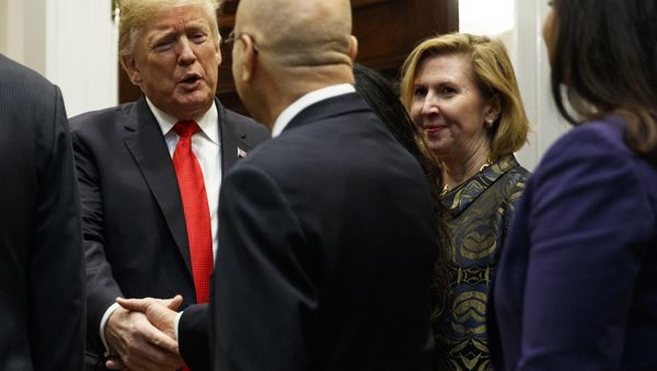 Mira Ricardel, right, watches as President Donald Trump arrives for a Diwali ceremonial lighting of the Diya in the Roosevelt Room of the White House, Tuesday, Nov. 13, 2018, in Washington - Sputnik International