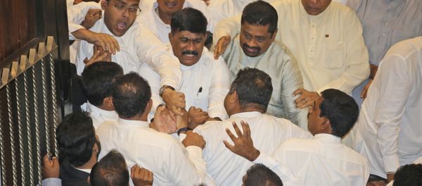 Sri Lankan Lawmakers fight in the parliament chamber in Colombo, Sri Lanka, November 15, 2018 - Sputnik International