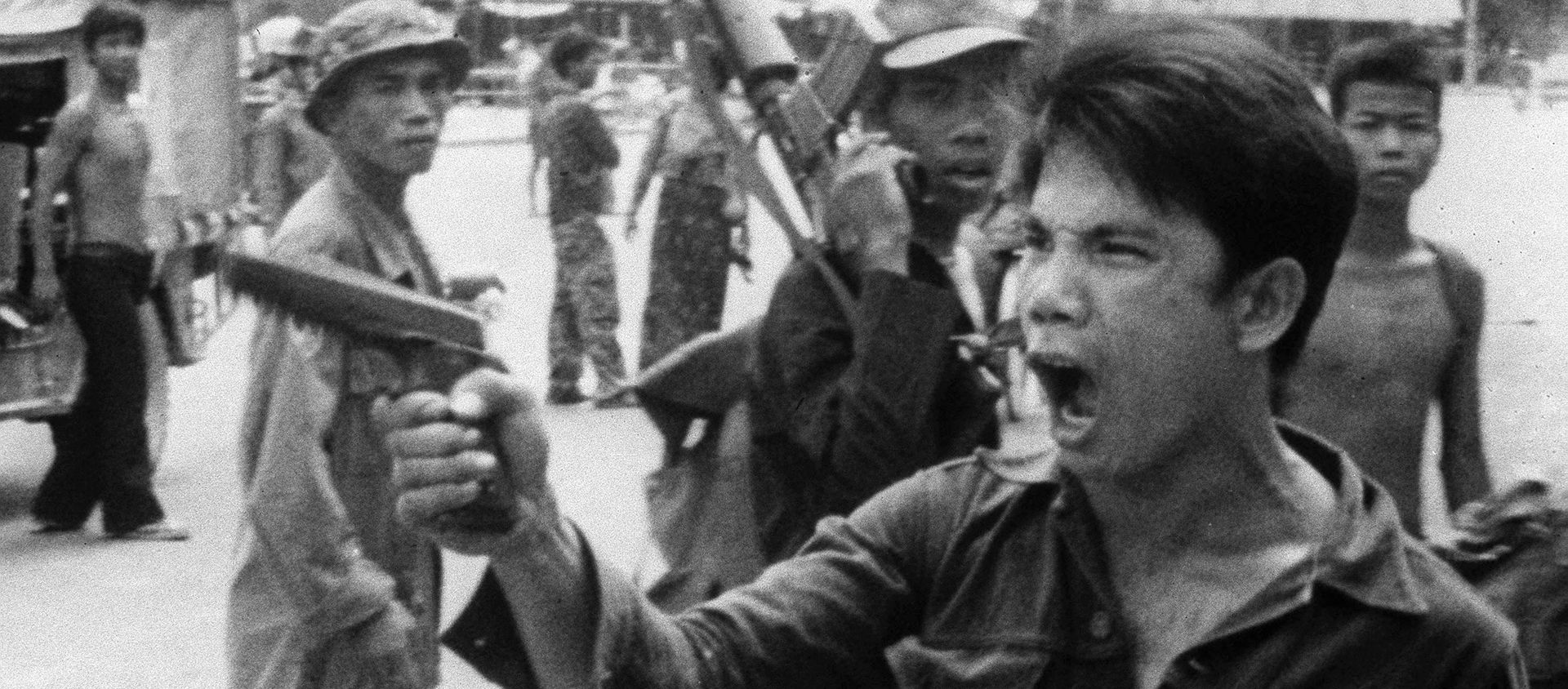 FILE - In this April 17, 1975 , file photo, a Khmer Rouge soldier waves his pistol and orders store owners to abandon their shops in Phnom Penh, Cambodia on as the capital fell to the communist forces FILE - In this April 17, 1975 , file photo, a Khmer Rouge soldier waves his pistol and orders store owners to abandon their shops in Phnom Penh, Cambodia on as the capital fell to the communist forces - Sputnik International, 1920, 16.11.2018