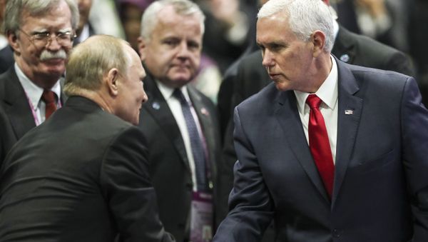 Russian President Vladimir Putin shakes hands with US Vice-President Mike Pence as Trump National Security Adviser John Bolton looks on. - Sputnik International