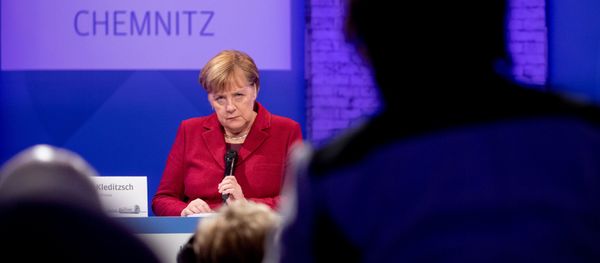 German Chancellor Angela Merkel speaks during the meeting with readers of 'Freie Presse' newspaper in Chemnitz - Sputnik International