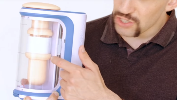 Autoblow AI inventor Brian Sloan displays his invention, the world's first oral sex robot - Sputnik International