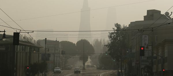 The Transamerica Pyramid is obscured by smoke and haze from wildfires Friday, Nov. 16, 2018, in San Francisco. - Sputnik International