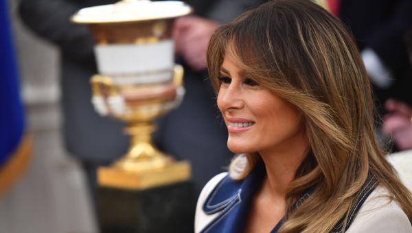US First Lady Melania Trump smiles as US President Donald Trump and Polish President Andrzej Duda speak to the media in the Oval office at the White House on September 18, 2018 in Washington,DC. - Sputnik International