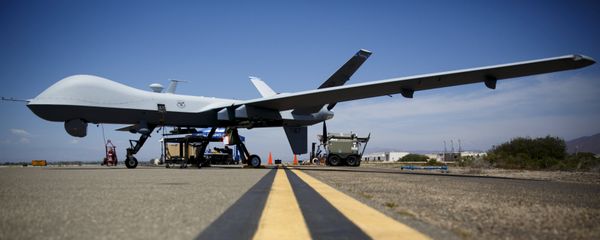A General Atomics MQ-9 Reaper stands on the runway during Black Dart, a live-fly, live fire demonstration of 55 unmanned aerial vehicles, or drones, at Naval Base Ventura County Sea Range, Point Mugu, near Oxnard, California July 31, 2015 A General Atomics MQ-9 Reaper stands on the runway during Black Dart, a live-fly, live fire demonstration of 55 unmanned aerial vehicles, or drones, at Naval Base Ventura County Sea Range, Point Mugu, near Oxnard, California July 31, 2015 - Sputnik International