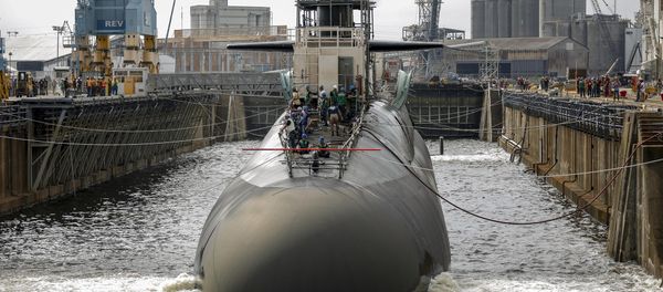 A submarine in one of the Norfolk Naval Shipyard's dry docks, which can be pumped dry to allow repairs on a vessel A submarine in one of the Norfolk Naval Shipyard's dry docks, which can be pumped dry to allow repairs on a vessel - Sputnik International