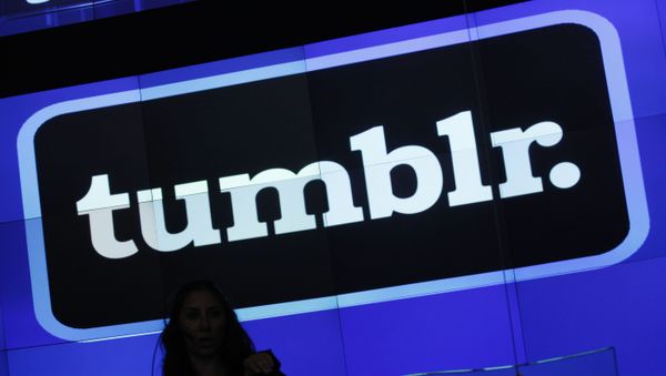 In this Thursday, July 11, 2013 photo, the Tumblr logo is displayed at Nasdaq, in New York. Yahoo has paid $1.1 billion to buy the blogging site Tumblr in one of this year's most buzzed-about deals. Now, Tumblr is flaunting its hipster credentials with a first-ever breakdown of the year's hottest trends, topics and celebrities. The retrospective starts Tuesday, Dec. 3, 2013, with an exploration of 20 categories ranging from the most popular musical groups to the most interesting architecture of 2013. - Sputnik International