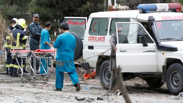 Afghan security forces and medics are seen at the site of a suicide attack in Kabul Afghan security forces and medics are seen at the site of a suicide attack in Kabul - Sputnik International