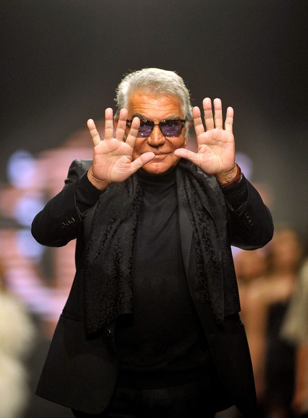 Italian fashion designer Roberto Cavalli waves during the Torch beach Fashion Show – Roberto Cavalli, presented in Budva, Montenegro, Monday, June 10, 2013 Italian fashion designer Roberto Cavalli waves during the Torch beach Fashion Show – Roberto Cavalli, presented in Budva, Montenegro, Monday, June 10, 2013 - Sputnik International