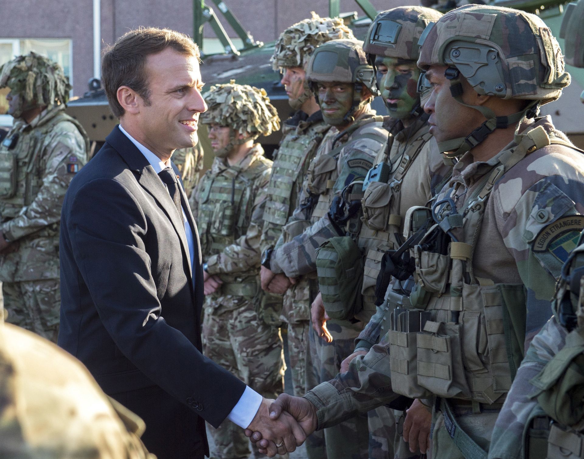 FILE - In this Friday, Sept. 29, 2017 file photo, France's President Emmanuel Macron, left, shakes hands with French soldiers of the NATO Battle Group at the Tapa military base, about 90 kilometers (56 miles) west of Tallinn, Estonia FILE - In this Friday, Sept. 29, 2017 file photo, France's President Emmanuel Macron, left, shakes hands with French soldiers of the NATO Battle Group at the Tapa military base, about 90 kilometers (56 miles) west of Tallinn, Estonia - Sputnik International, 1920, 08.12.2021